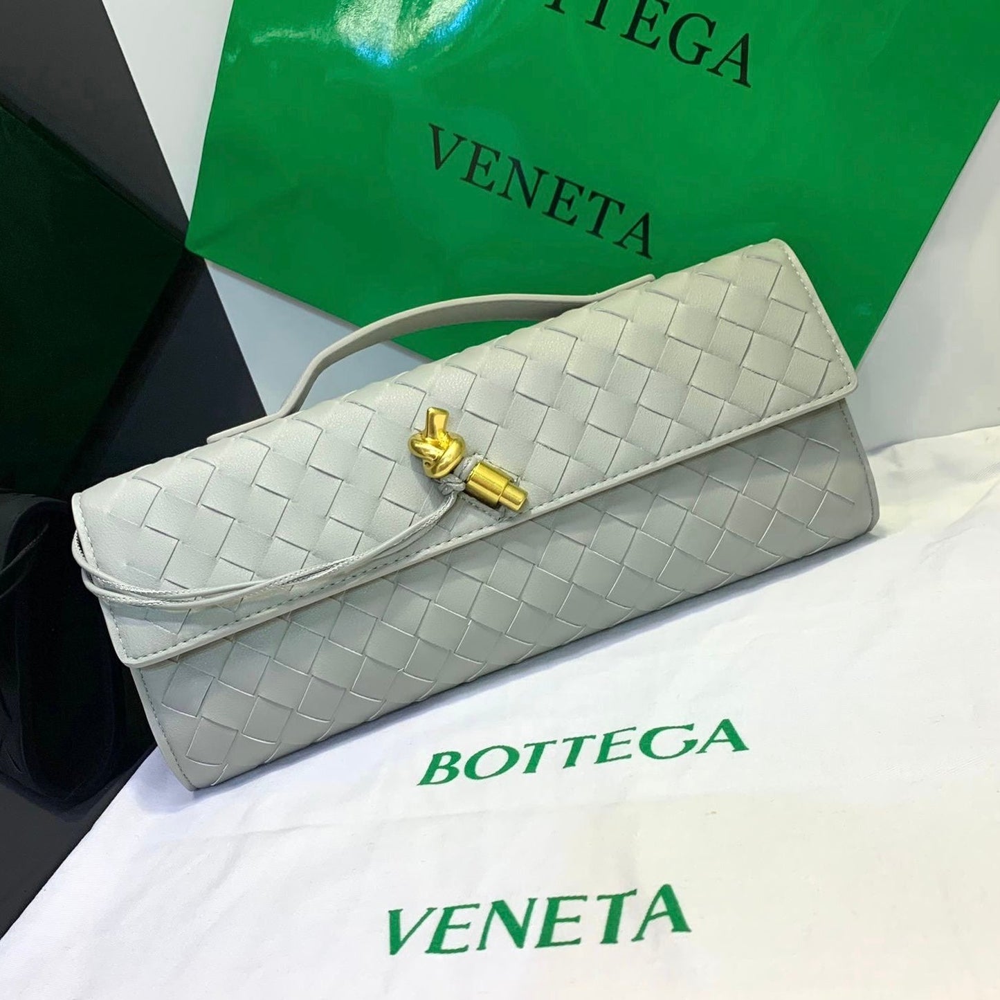 Long Andiamo Handle Clutch in Leather Bag