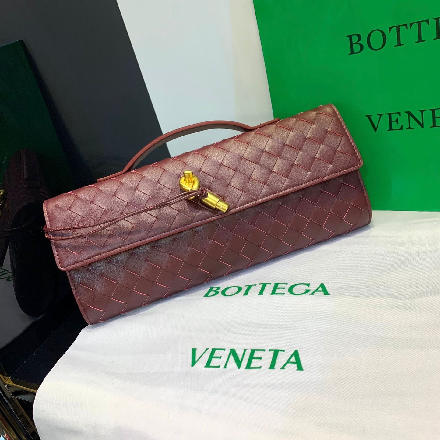 Long Andiamo Handle Clutch in Leather Bag