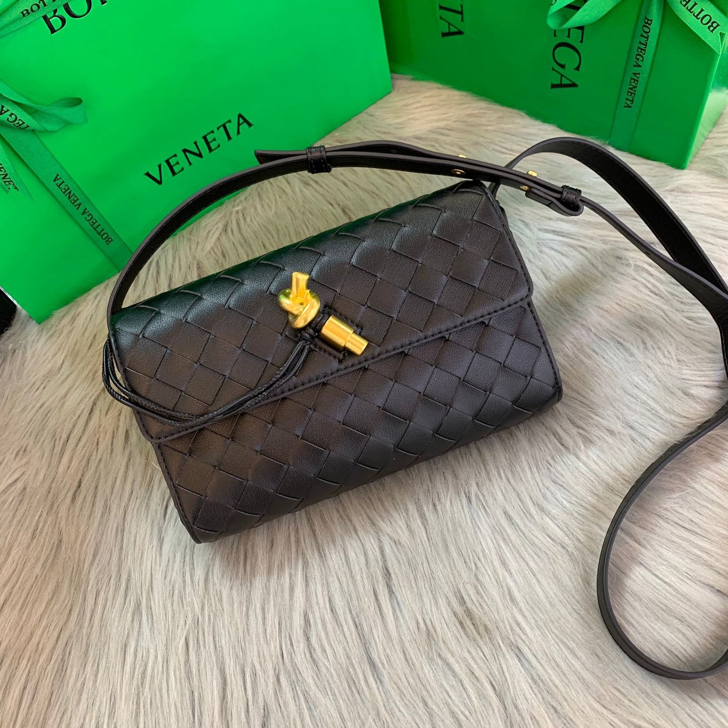 Andiamo Clutch in Metallic Intrecciato Leather Bag