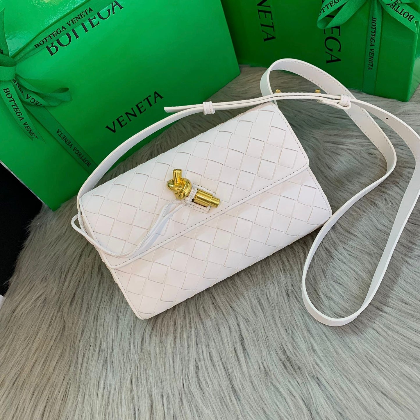 Andiamo Clutch in Metallic Intrecciato Leather Bag