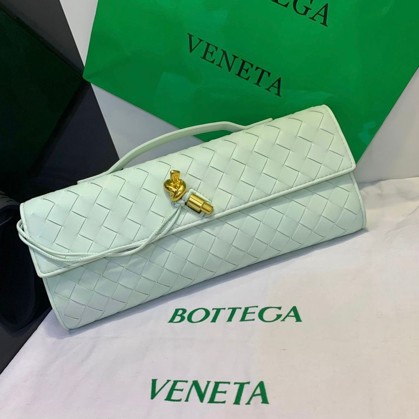 Long Andiamo Handle Clutch in Leather Bag